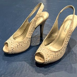 Peep toe sling backs